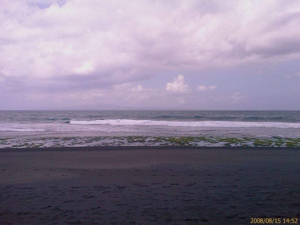 The undeveloped Keramas coastline on Tony Cannon's first visit in August 2008, rice paddies meeting black sand beach