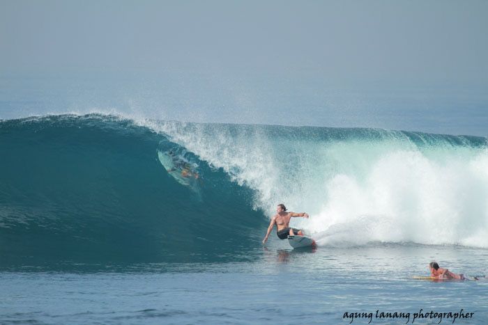 Louie Egan deep inside a barrelling wave at Keramas surf break during an early due diligence surf trip