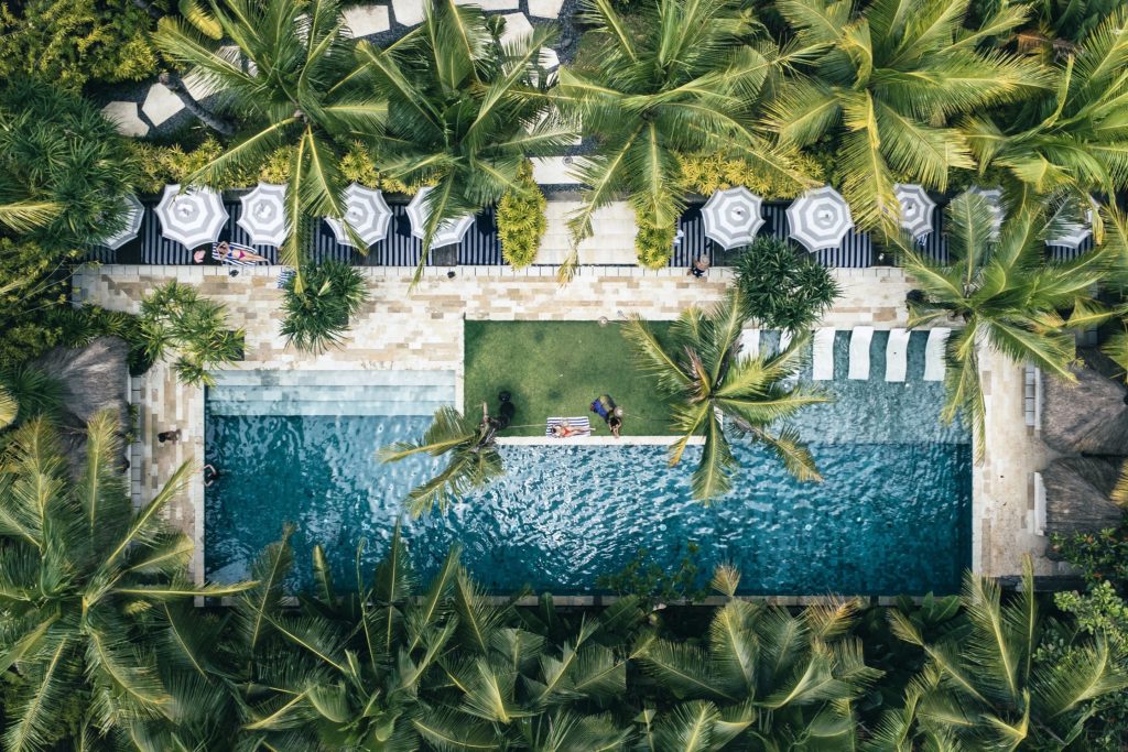 Komune's Health Hub from above. Beautiful pool facilities surrounded by lush jungle.